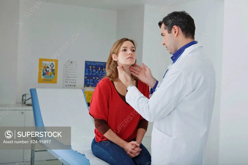 WOMAN PALPATING LYMPH NODE